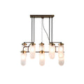 Moderne hanglamp met acht glazen kappen en gouden details